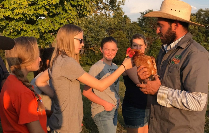 meeting the chickens at organic camp