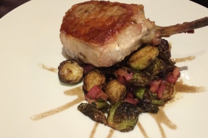 Dry Aged Duroc Pork Chop with Brussels Sprouts, Pancetta, and Truffle Maple Glaze